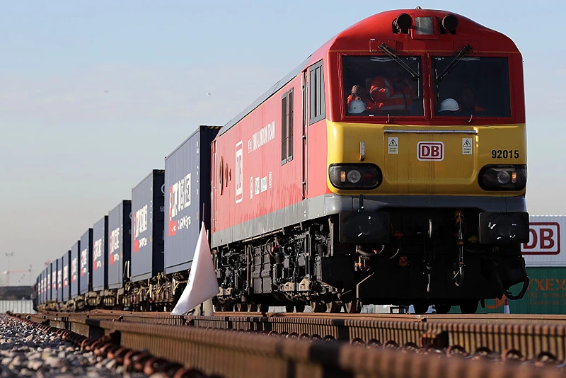 BARKING, ENGLAND - JANUARY 18: A train engine pulls carriages that started their Journey in Yiwu in China into Barking rail freight terminal on January 18, 2017 in Barking, England. After travelling for 16 days and covering around 7,456 miles passing through China, Kazakhstan, Russia, Belarus, Poland, Germany, Belgium and France, The East Wind freight train which is made up of 34 wagons is hoped will herald a 'new era of UK-China relations'. The Engine that started the journey was changed to accomodate different gauge tracks in the UK. (Photo by Dan Kitwood/Getty Images)