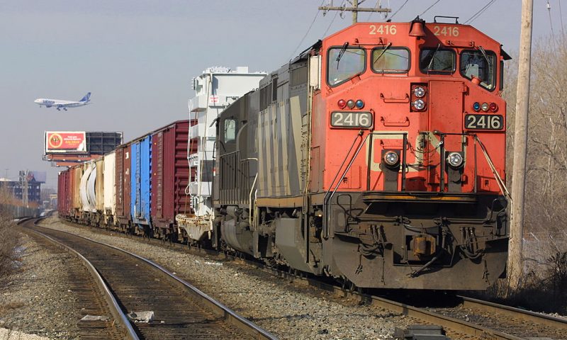 A Canadian National freight train idles on Wisconsin Central railroad tracks near Rosemont, IL. as it waits February 1, 2001 for an approach signal. Canadian National Railway Co. has reached a deal to buy Wisconsin Central Transportation Corp., for $800 million in cash. Wisconsin Central, based in Rosemont, IL., has 2,850 miles of track and track rights in Wisconsin, Illinois, Minnesota, Michigan's Upper Peninsula, and Ontario. The deal announced January 30, 2001 would "secure a link" connecting Chicago and Superior, Wis., to Canadian National's network across Canada, Canadian National said. The rail industry in the United States had been going through a whirlwind of consolidations, some of which created severe traffic disruptions. Last year, U.S. regulatory authorities rejected Canadian National's plan to merge with Burlington Northern Santa Fe railway to create North America's largest rail company in a deal worth $6.2 billion. (Photo by Tim Boyle/Newsmakers)