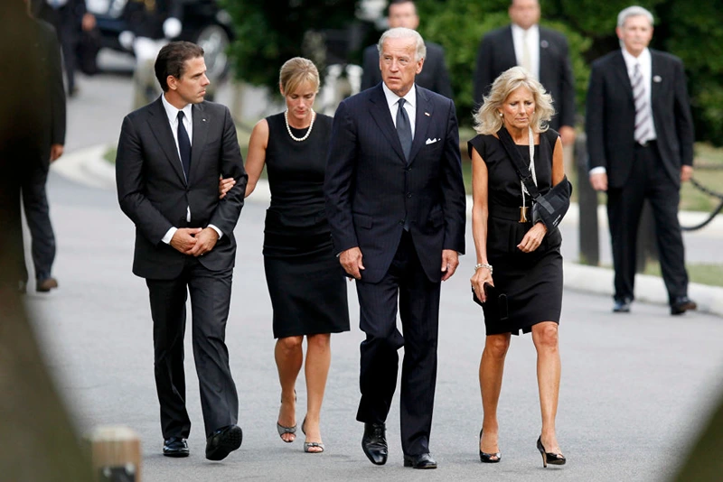 U.S. Vice President Joe Biden (2-R) arrives at Arlington National Cemetery with his wife, Jill Biden (R), son Hunter Biden (L) and daughter-in-law, Kathleen Biden for the burial of U.S. Sen. Edward Kennedy on August 29, 2009 in Arlington, Virginia. U.S. Sen. Kennedy will be buried near his brothers, former U.S. President John F. Kennedy and former U.S. Sen. Robert Kennedy. (Photo by Jim Bourg-Pool/Getty Images)