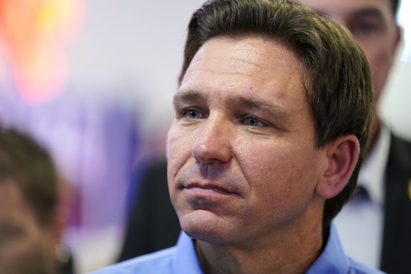 Florida Gov. Ron DeSantis greets audience members during a fundraising picnic for U.S. Rep. Randy Feenstra, R-Iowa, Saturday, May 13, 2023, in Sioux Center, Iowa. (AP Photo/Charlie Neibergall)