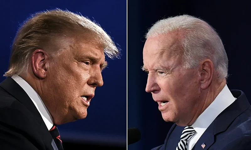 TOPSHOT - (COMBO) This combination of pictures created on September 29, 2020 shows US President Donald Trump (L) and Democratic Presidential candidate former Vice President Joe Biden squaring off during the first presidential debate at the Case Western Reserve University and Cleveland Clinic in Cleveland, Ohio on September 29, 2020. (Photo by JIM WATSON,SAUL LOEB/AFP via Getty Images)