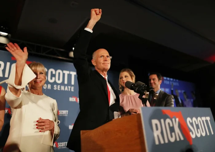 NAPLES, FLORIDA - NOVEMBER 06: Florida Governor Rick Scott and his wife, Ann Scott, along with their family take to the stage during his election night party at the LaPlaya Beach & Golf Resort on November 06, 2018 in Naples, Florida. Governor Scott defeated Sen. Bill Nelson for the Florida Senate seat. (Photo by Joe Raedle/Getty Images)
