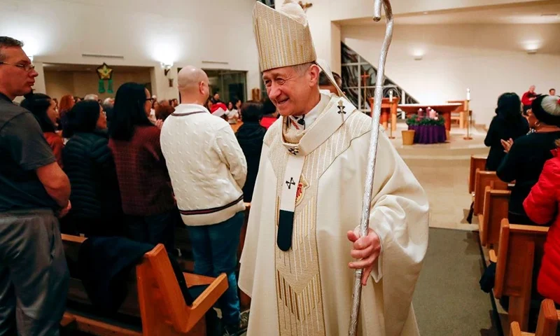 Cardinal Blase J. Cupich (C) presides over a Simbang Gabi Mass at the Old St. Mary's Catholic Church in Chicago, Illinois, on December 20, 2018. - US bishops preparing for a meeting to address the sexual abuse scandal roiling the Catholic Church (KAMIL KRZACZYNSKI/AFP via Getty Images)