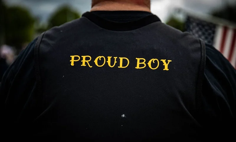 A man wears a Proud Boy vest as several hundred members of the Proud Boys and other similar groups gathered at Delta Park in Portland, Oregon on September 26, 2020. - Far-right group "Proud Boys" members gather in Portland to show support to US President Donald Trump and to condemn the violence that has been occurring for more than three months during "Black Lives Matter" and "Antifa" protests. (Photo by Maranie R. STAAB / AFP) (Photo by MARANIE R. STAAB/AFP via Getty Images)