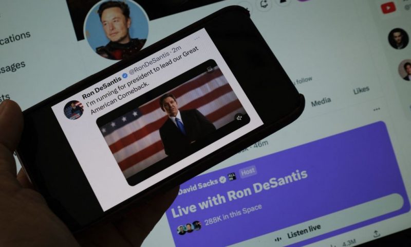 This illustration photo shows the Twitter page of Ron DeSantis as he announces his 2024 presidential run with a background of the live Twitter talk with Elon Musk on May 24, 2023 in Los Angeles, California. Republican Ron DeSantis kicked off his 2024 presidential campaign May 24, 2023 with a live event opposite Twitter boss Elon Musk that descended into farce as it was beset by technical bugs. (Photo by Chris DELMAS / AFP) (Photo by CHRIS DELMAS/AFP via Getty Images)