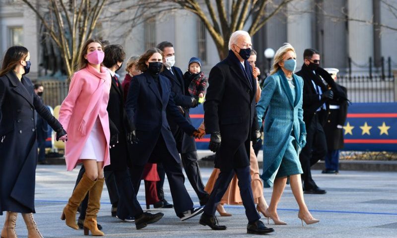 WASHINGTON, DC - JANUARY 20: U.S. President Joe Biden, First Lady Dr. Jill Biden and family walk the abbreviated parade route after Biden's inauguration on January 20, 2021 in Washington, DC. Biden became the 46th president of the United States earlier today during the ceremony at the U.S. Capitol. (Photo by Mark Makela/Getty Images)