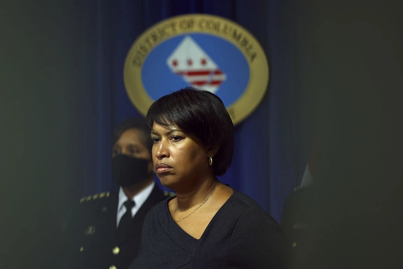 Washington DC Mayor Muriel Bowser looks on during a press conference on February 28, 2022 in Washington, DC. Washington DC Mayor Muriel Bowser was joined by local and federal law enforcement officials to discuss security measures that are being implemented in the District ahead of U.S. President Joe Biden's State of the Union address and a potential protest by truckers against mask mandates. (Photo by Justin Sullivan/Getty Images)