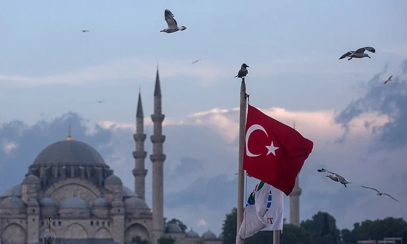 Seagulls fly over a Turkish flag on May 3, 2016 in Istanbul Turkey. The European Commission is expected to recommend granting Turks with visa free travel in Europe's Schengen area, as part of the EU-Turkey migrant deal on Wednesday. EU member states and the European Parliament are set to vote on the visa deal in June, which could see visa free travel granted to Turkish citizens as early as the end of June. (Photo by Chris McGrath/Getty Images)
