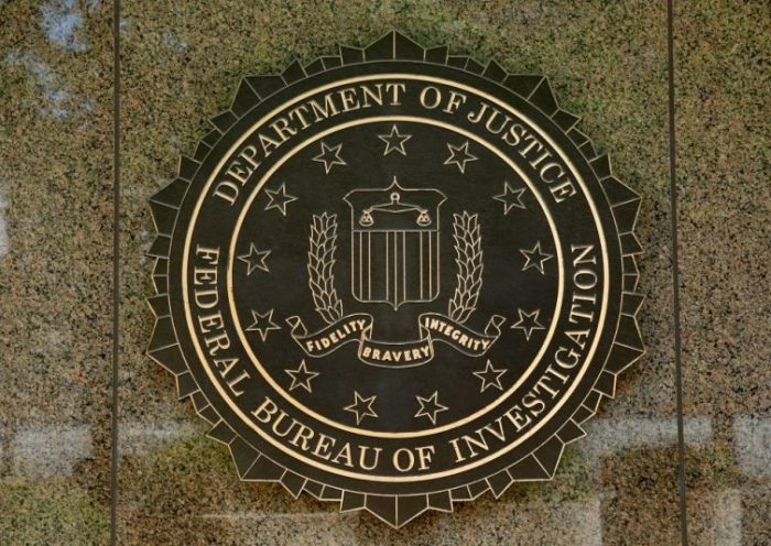 The FBI seal is seen outside the headquarters building in Washington, DC on July 5, 2016. - The FBI said Tuesday it will not recommend charges over Hillary Clinton's use of a private email server as secretary of state, but said she had been "extremely careless" in her handling of top secret data. The decision not to recommend prosecution will come as a huge relief for the presumptive Democratic nominee whose White House campaign has been dogged by the months-long probe. (Photo by YURI GRIPAS / AFP) (Photo credit should read YURI GRIPAS/AFP via Getty Images)