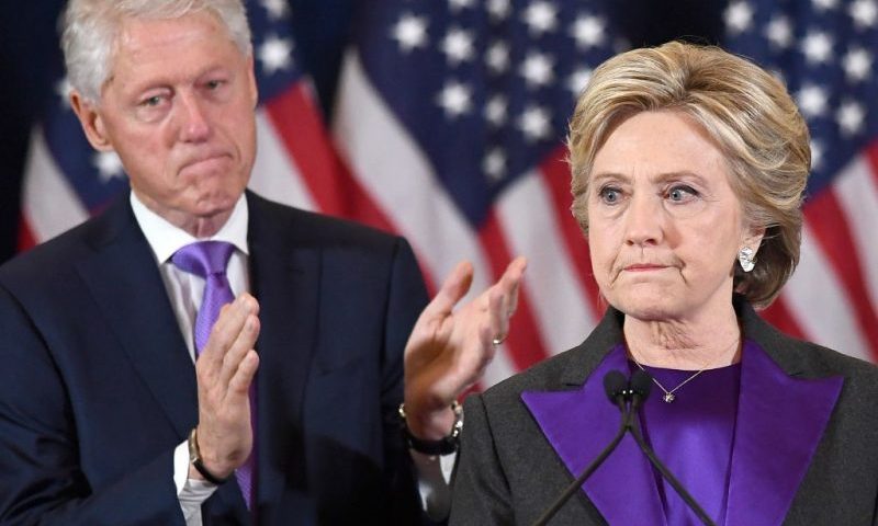 TOPSHOT - US Democratic presidential candidate Hillary Clinton makes a concession speech after being defeated by Republican President-elect Donald Trump, as former President Bill Clinton looks on in New York on November 9, 2016. / AFP PHOTO / JEWEL SAMAD (Photo credit should read JEWEL SAMAD/AFP via Getty Images)