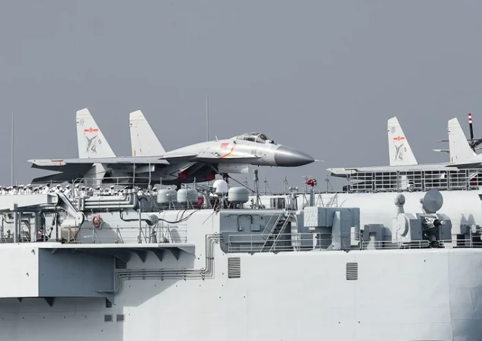 J-15 fighter jets are seen on the flight deck of China's sole aircraft carrier, the Liaoning, as it arrives in Hong Kong waters. (Photo credit should read ANTHONY WALLACE/AFP via Getty Images)