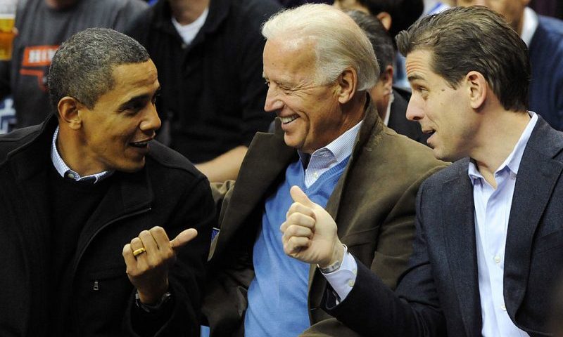 WASHINGTON - JANUARY 30: (AFP OUT) U.S. President Barack Obama (L) greets Vice President Joe Biden (C) and his son Hunter Biden as they attend the game between the Duke Blue Devils and Georgetown Hoyas on January 30, 2010 at the Verizon Center in Washington, DC. (Photo by Alexis C. Glenn-Pool/Getty Images)