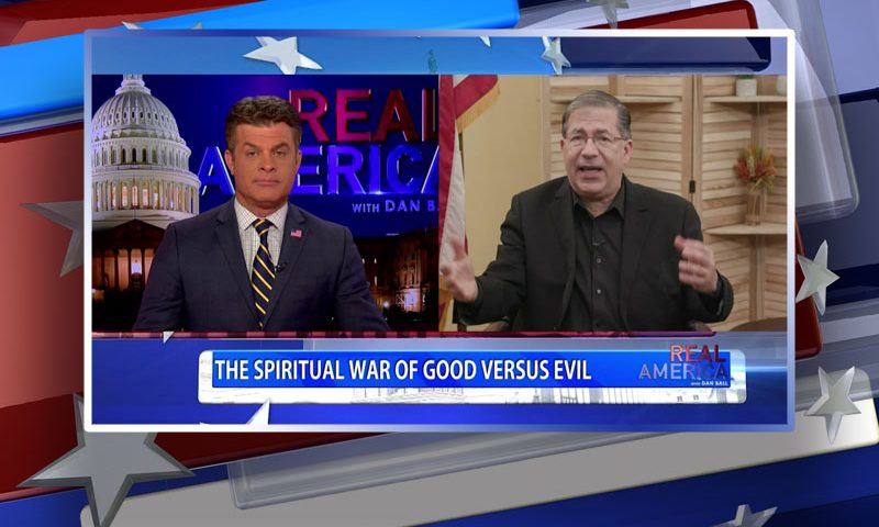 Video still from Father Frank Pavon's interview with Real America on One America News Network