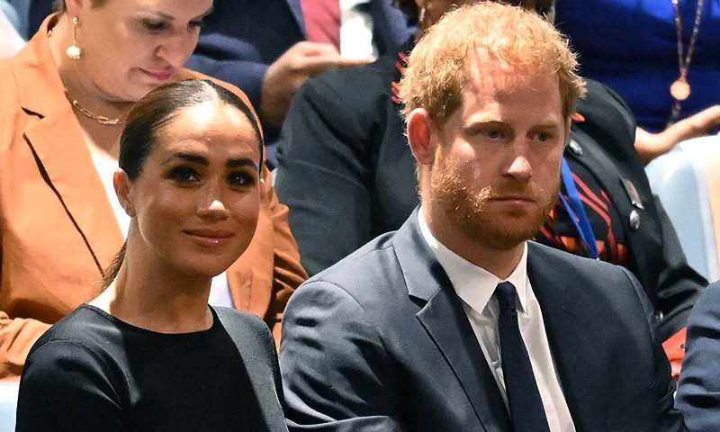 Prince Harry (R) and Meghan Markle (L), the Duke and Duchess of Sussex, attend the 2020 UN Nelson Mandela Prize award ceremony at the United Nations in New York on July 18, 2022. - The Prize is being awarded to Marianna Vardinoyannis of Greece and Doctor Morissanda Kouyate of Guinea. (Photo by TIMOTHY A. CLARY/AFP via Getty Images)