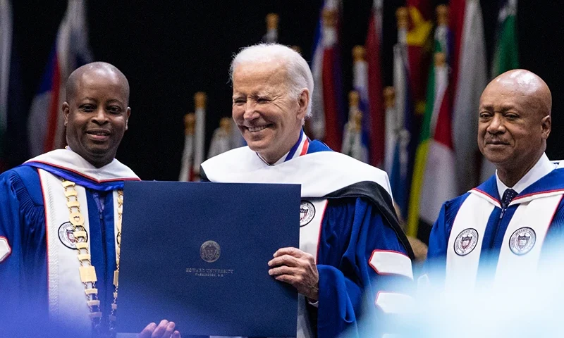 WASHINGTON, DC - MAY 13: U.S. President Joe Biden receives an honorary Doctor of Humane Letters at the 2023 Commencement Ceremony for Howard University at Capitol One Arena on May 13, 2023 in Washington, DC. President Joe Biden is the seventh president to deliver the address at Howard University. (Photo by Anna Rose Layden/Getty Images)