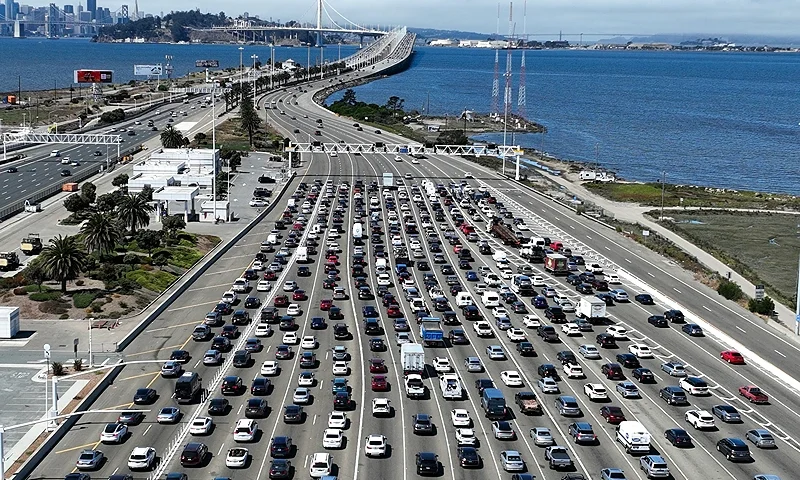 Traffic backs up at the San Francisco-Oakland Bay Bridge toll plaza on August 24, 2022 in Oakland, California. California is set to implement a plan to prohibit the sale of new gasoline-powered cars in the state by 2035 in an effort to fight climate change by transitioning to electric vehicles. (Photo by Justin Sullivan/Getty Images)