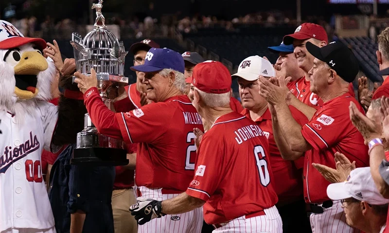 Republican manager Rep. Roger Williams, R-Texas, holds the trophy after the GOP beat the Democrats 16-6 in the Annual Congressional Baseball Game at National Park in Washington on Wednesday, June 14, 2023. (AP Photo/Jose Luis Magana)