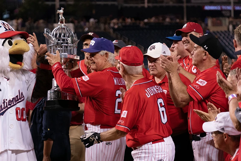 Republican manager Rep. Roger Williams, R-Texas, holds the trophy after the GOP beat the Democrats 16-6 in the Annual Congressional Baseball Game at National Park in Washington on Wednesday, June 14, 2023. (AP Photo/Jose Luis Magana) 