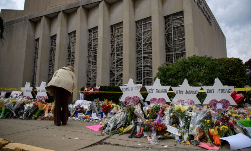Mourners visit the memorial outside the Tree of Life Synagogue on October 31, 2018 in Pittsburgh, Pennsylvania. Eleven people were killed in a mass shooting at the Tree of Life Congregation in Pittsburgh's Squirrel Hill neighborhood on October 27. (Photo by Jeff Swensen/Getty Images)