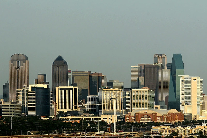 DALLAS, TX - JUNE 07: A general view of the skyline of downtown Dallas, Texas as the American Airlines Center can be seen before Game Four of the 2011 NBA Finals on June 7, 2011 in Dallas, Texas. NOTE TO USER: User expressly acknowledges and agrees that, by downloading and/or using this Photograph, user is consenting to the terms and conditions of the Getty Images License Agreement (Photo by Mike Ehrmann/Getty Images)