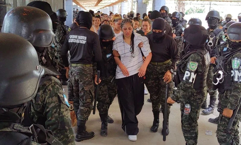 Members of the Military Police of Public Order (PMOP) take control of the Women's Social Adaptation Center (CEFAS) prison in Tamara, 25 km north of Tegucigalpa, on June 26, 2023. The government announced last week that military police would assume control of Honduras's 21 prisons for a period of one year starting July 1, as well as train 2,000 new prison guards after a vicious battle between rival gangs left at least 46 women dead in a prison near the capital Tegucigalpa. (Photo by STRINGER / AFP) (Photo by STRINGER/AFP via Getty Images)