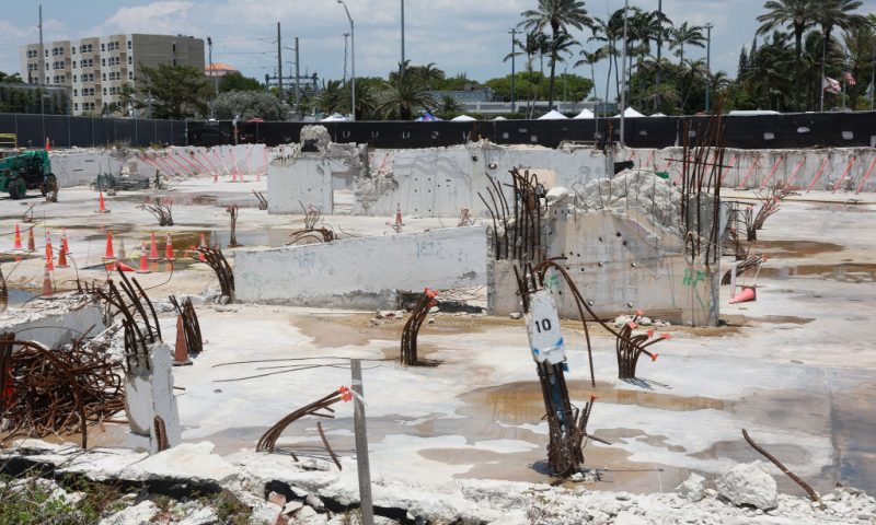 What is left of the foundation of the 12-story Champlain Towers South condo building is seen during the one year Surfside Remembrance Event on June 24, 2022 in Surfside, Florida. 98 people died when the building partially collapsed on June 24, 2021. (Photo by Joe Raedle/Getty Images)