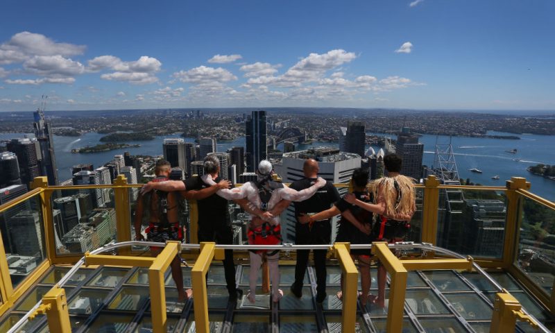 Haka For Life members Arohi Chapman-Barber, Tane Johnson, Leon Ruri, Cherene Silbery and Jayvin Davies are joined by First Nations performer, Wiradjuri man Karl Wickey at the Sydney Tower Eye on November 17, 2022 in Sydney, Australia. To inspire conversations around mental health on International Mens Day, performers from Haka For Life took to Sydney's tallest stage, Skywalk at the Sydney Tower Eye. (Photo by Lisa Maree Williams/Getty Images)