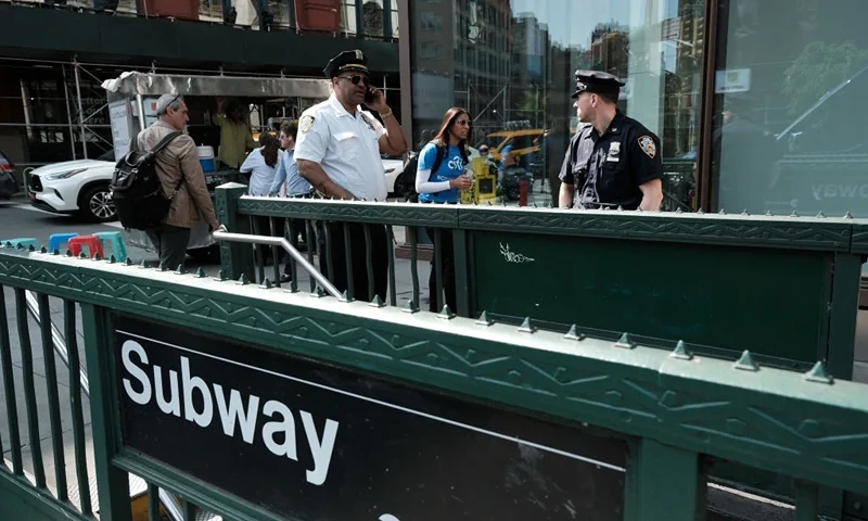 NEW YORK, NEW YORK - MAY 10: Police stand outside the Broadway-Lafayette subway station where Jordan Neely was fatally choked by a fellow passenger a week ago on May 10, 2023 in New York City. Officials called for charges to be brought against the passenger who choked Neely. (Photo by Spencer Platt/Getty Images)