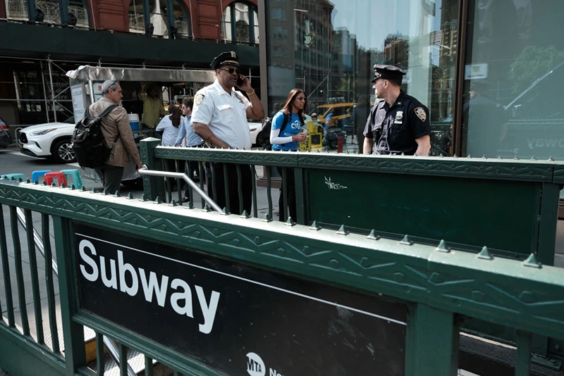 NEW YORK, NEW YORK - MAY 10: Police stand outside the Broadway-Lafayette subway station where Jordan Neely was fatally choked by a fellow passenger a week ago on May 10, 2023 in New York City. Officials called for charges to be brought against the passenger who choked Neely. (Photo by Spencer Platt/Getty Images)