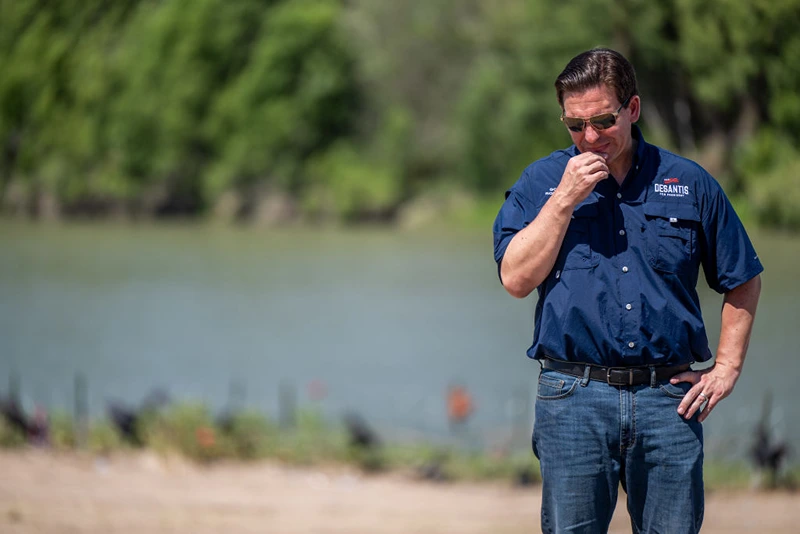 EAGLE PASS, TEXAS - JUNE 26: Republican presidential candidate, Florida Gov. Ron DeSantis stands on the banks of the Rio Grande during a press conference on June 26, 2023 in Eagle Pass, Texas. Gov. DeSantis visited the border along the Rio Grande and engaged residents and voters while speaking on border security at an event earlier in the day. (Photo by Brandon Bell/Getty Images)