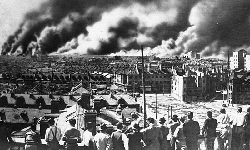 A panorama of the Zabei district of Shanghai showing smoke billowing from buildings, after the city had been bombed by Japanese planes, during the Sino-Japanese War. (Photo by Keystone/Getty Images)