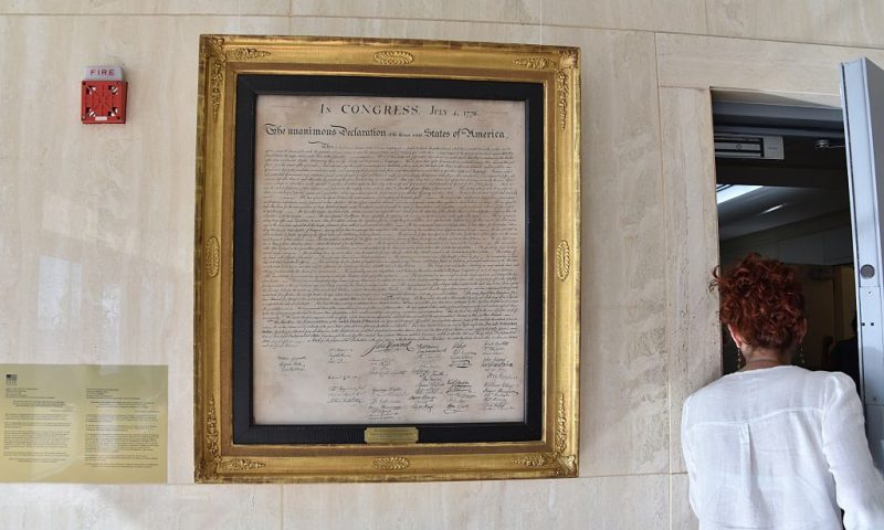 A copy of the United States' Declaration of Independence hangs on a wall at the US embassy in Havana -- the former US Interest Section -- on August 7, 2015. Last month, President Barack Obama unveiled a breakthrough deal with Cuba to reopen embassies in Washington and Havana, in a major step toward ending decades of Cold war enmity. US Secretary of State John Kerry prepares to visit the island nation on August 14th to officially reopen the US embassy and fly the American flag over the building for the first time since January 3, 1961. AFP PHOTO / ADALBERTO ROQUE (Photo credit should read ADALBERTO ROQUE/AFP via Getty Images)