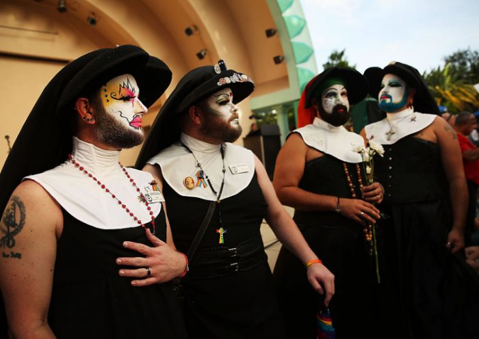 Members of the Sisters of Perpetual Indulgence attend a memorial service on June 19, 2016 in Orlando, Florida. The Sisters of Perpetual Indulgence are a charity, protest, and street performance organization that uses drag and religious imagery to call attention to sexual intolerance. Thousands of people are expected at the evening event which will feature entertainers, speakers and a candle vigil at sunset. In what is being called the worst mass shooting in American history, Omar Mir Seddique Mateen killed 49 people at the popular gay nightclub early last Sunday. Fifty-three people were wounded in the attack which authorities and community leaders are still trying to come to terms with. (Photo by Spencer Platt/Getty Images)
