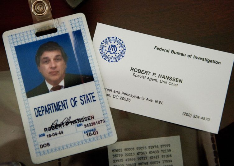 The identification and business card of former FBI agent Robert Hanssen are seen inside a display case at the FBI Academy in Quantico, Virginia, May 12, 2009. Hanssen was sentenced to life in prison without parole for spying for the Soviet Union and Russia while he worked for the FBI. AFP Photo/Paul J. Richards (Photo credit should read PAUL J. RICHARDS/AFP via Getty Images)