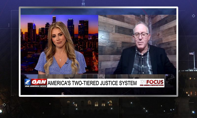 Video still from Trevor Loudon's interview with In Focus on One America News Network