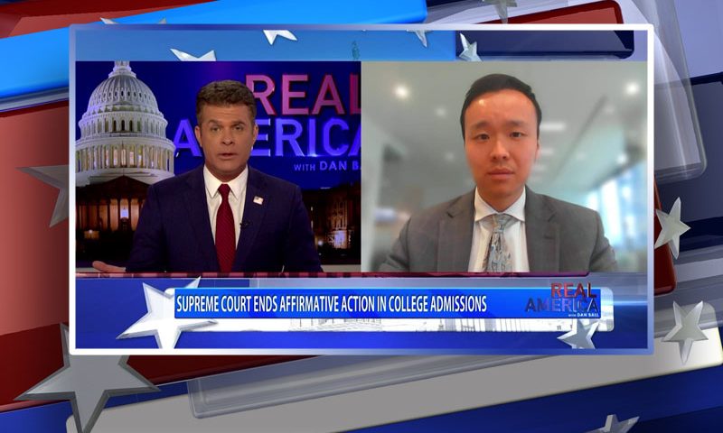 Video still from Kenny Xu's interview with Real America on One America News Network