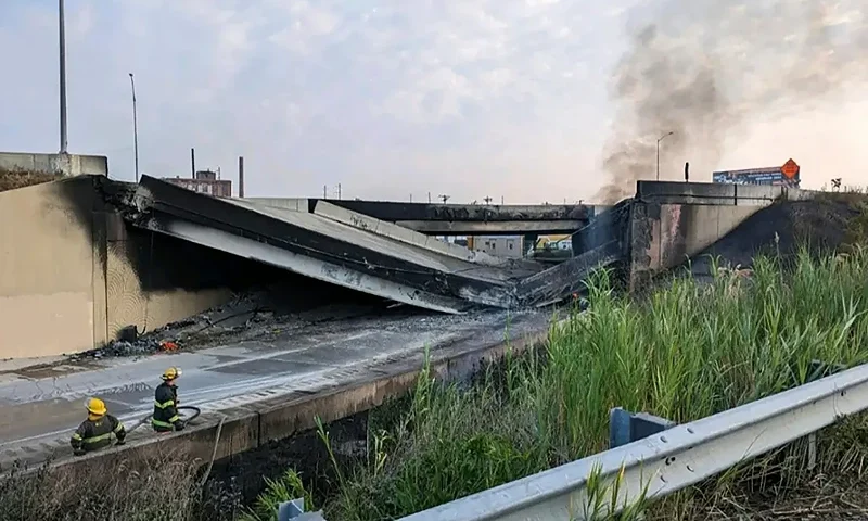 A section of Interstate 95 collapsed in Philadelphia during a tanker truck fire Sunday. (Photo via AP News)
