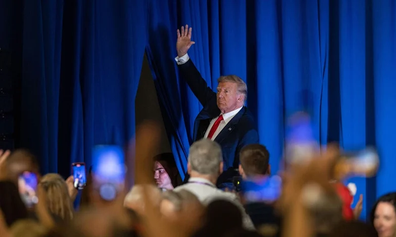Republican presidential candidate, former U.S. President Donald Trump waves to supporters before going backstage following his speech at the New Hampshire Federation of Republican Women's Lilac Luncheon on June 27, 2023 in Concord, New Hampshire. Republican presidential candidate, Florida Gov. Ron DeSantis is also holding a campaign event in New Hampshire today. (Photo by Scott Eisen/Getty Images)
