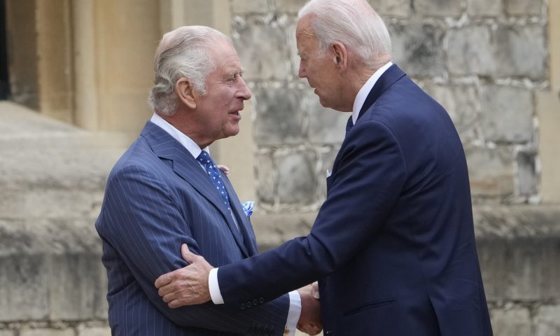 US President Joe Biden shakes hands with Britain's King Charles III during a welcoming ceremony at Windsor Castle in Windsor, England, Monday, July 10, 2023. (AP Photo/Susan Walsh)