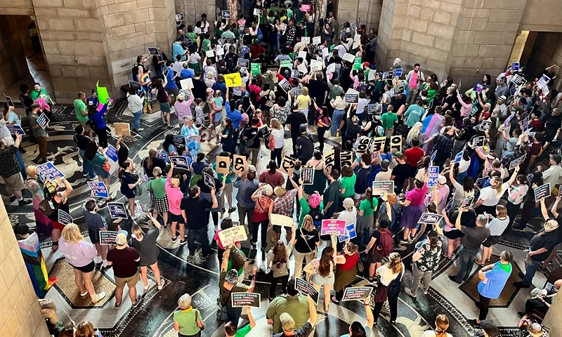 Hundreds of people descend on the Nebraska Capitol, in Lincoln, on May 16, 2023, to protest plans by conservative lawmakers in the Nebraska Legislature to revive an abortion ban. An 18-year-old Nebraska woman was sentenced Thursday, July 20 to 90 days in jail followed by two years of probation for burning and burying a fetus last year after she took medication given to her by her mother to end her pregnancy, Celeste Burgess was sentenced after pleading guilty earlier this year to a count of concealing or abandoning a dead body. (AP Photo/Margery Beck, file)