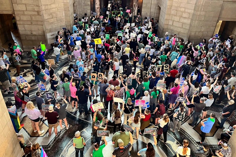 Hundreds of people descend on the Nebraska Capitol, in Lincoln, on May 16, 2023, to protest plans by conservative lawmakers in the Nebraska Legislature to revive an abortion ban. An 18-year-old Nebraska woman was sentenced Thursday, July 20 to 90 days in jail followed by two years of probation for burning and burying a fetus last year after she took medication given to her by her mother to end her pregnancy, Celeste Burgess was sentenced after pleading guilty earlier this year to a count of concealing or abandoning a dead body. (AP Photo/Margery Beck, file)