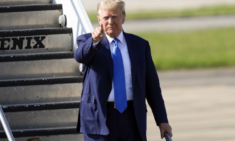 Former President Donald Trump arrives at New Orleans International Airport in New Orleans, Tuesday, July 25, 2023. (AP Photo/Gerald Herbert)