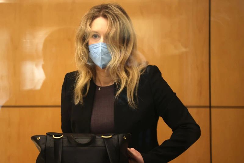 Former Theranos founder and CEO Elizabeth Holmes goes through security after arriving for court at the Robert F. Peckham Federal Building September 17, 2021 in San Jose, California. Holmes is facing charges of conspiracy and wire fraud for allegedly engaging in a multimillion-dollar scheme to defraud investors with the Theranos blood testing lab services. (Photo by Justin Sullivan/Getty Images)