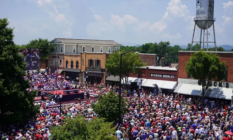 PICKENS, SOUTH CAROLINA - JULY 01: A crowd watches former President Donald Trump during a campaign event on July 1, 2023 in Pickens, South Carolina. The former president faces a growing list of primary challengers in the Republican Party. (Photo by Sean Rayford/Getty Images)