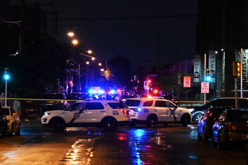 PHILADELPHIA, PENNSYLVANIA - JULY 3: Police work the scene of a shooting on July 3, 2023 in Philadelphia, Pennsylvania. Early reports say the suspect is in custody after shooting 6 people in the Kingsessing section of Philadelphia on July 3rd. (Photo by Drew Hallowell/Getty Images)
