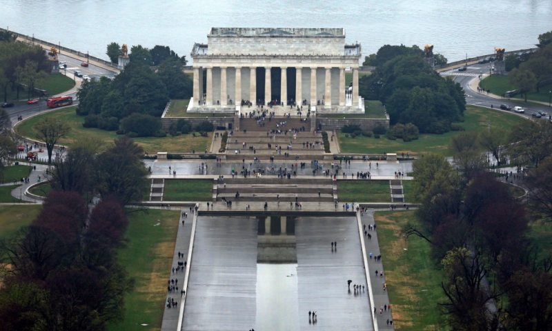 WASHINGTON, DC - MARCH 25: An aerial view of the Lincoln Memorial is seen during high tide amid cherry blossoms in peak bloom on March 25, 2023 in Washington, DC. According to a new report from the National Oceanic and Atmospheric Administration (NOAA), climate change and rising sea levels are expected to threaten the root systems of cherry trees near the Tidal Basin. The National Park Service predicted that peak bloom happens from March 22 to March 25 this year. (Photo by Alex Wong/Getty Images)