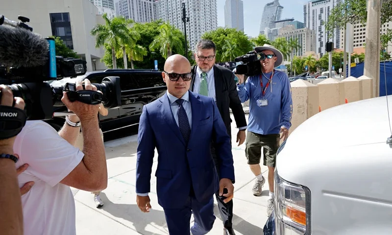 MIAMI, FLORIDA - JULY 6: Walt Nauta, valet to former U.S. President Donald Trump and a co-defendant in federal charges filed against Trump, arrives with Lawyer, Stanley Woodward, at the James Lawrence King Federal Justice Building on July 6, 2023 in Miami, Florida. The arraignment for Walt Nauta, charged alongside former President Donald Trump for allegedly mishandling classified documents, was postponed and rescheduled for July 6. It was postponed due to Nauta's inability to find a Florida-based attorney and being stuck in Newark, NJ, after his flight was canceled. (Photo by Alon Skuy/Getty Images)