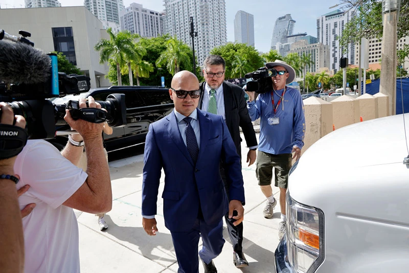 MIAMI, FLORIDA - JULY 6: Walt Nauta, valet to former U.S. President Donald Trump and a co-defendant in federal charges filed against Trump, arrives with Lawyer, Stanley Woodward, at the James Lawrence King Federal Justice Building on July 6, 2023 in Miami, Florida. The arraignment for Walt Nauta, charged alongside former President Donald Trump for allegedly mishandling classified documents, was postponed and rescheduled for July 6. It was postponed due to Nauta's inability to find a Florida-based attorney and being stuck in Newark, NJ, after his flight was canceled. (Photo by Alon Skuy/Getty Images)
