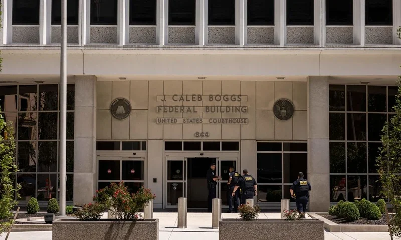 Police officers enter the J. Caleb Boggs Federal Building in Wilmington, Delaware, on July 26, 2023. Hunter Biden pleaded not guilty to minor tax offenses on July 26, as a deal with federal prosecutors fell apart in a Delaware court. The surprise reversal of Biden's agreement last month to settle the charges came after Judge Maryellen Noreika raised questions about the complicated deal that would also settle a separate gun charge against the president's son, US media reported. (Photo by RYAN COLLERD / AFP) (Photo by RYAN COLLERD/AFP via Getty Images)