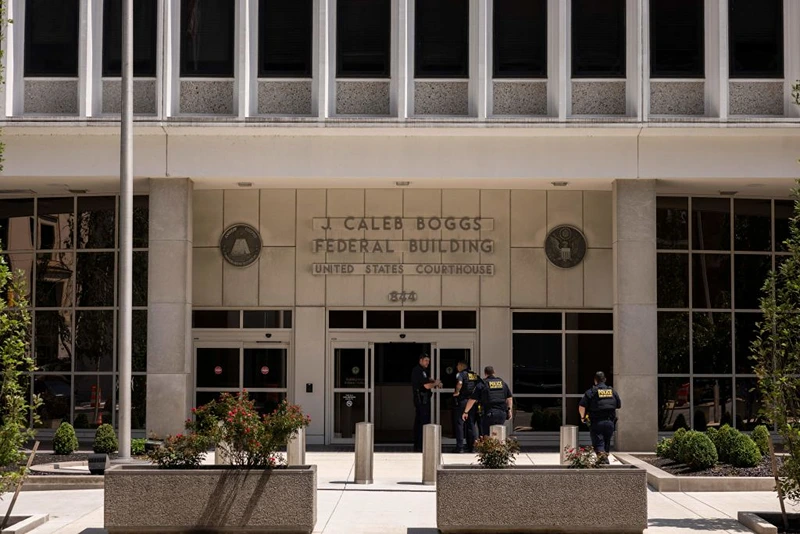Police officers enter the J. Caleb Boggs Federal Building in Wilmington, Delaware, on July 26, 2023. Hunter Biden pleaded not guilty to minor tax offenses on July 26, as a deal with federal prosecutors fell apart in a Delaware court. The surprise reversal of Biden's agreement last month to settle the charges came after Judge Maryellen Noreika raised questions about the complicated deal that would also settle a separate gun charge against the president's son, US media reported. (Photo by RYAN COLLERD / AFP) (Photo by RYAN COLLERD/AFP via Getty Images)